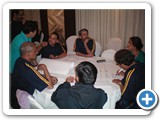 team member discussing a point with Falguni Shroff in a CRM peogramme